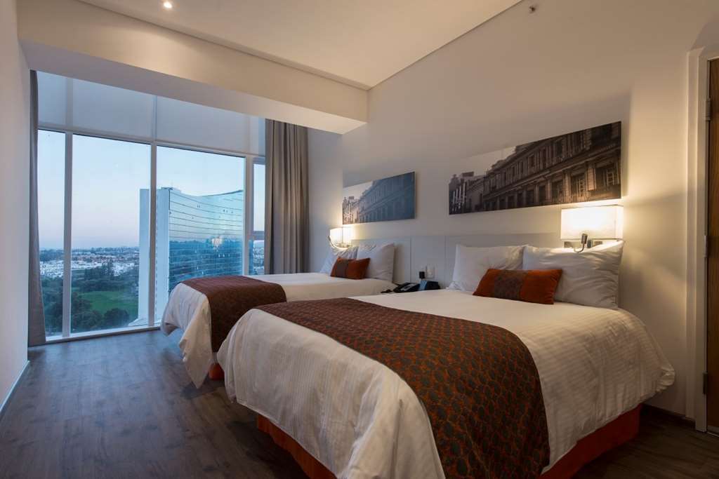 Camino Real Puebla Hotel & Suites Oda fotoğraf